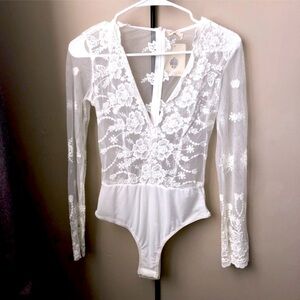 Showpo “Love Buzz” bodysuit, US size 2